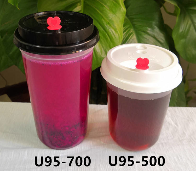 Le chiare tazze di plastica eliminabili asportabili hanno ispessito 95 il calibro a forma di U 500ml con i coperchi