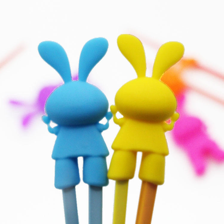 Testa di bacchette in silicone a forma di coniglio a forma di cartone animato per l'allenamento dei bambini