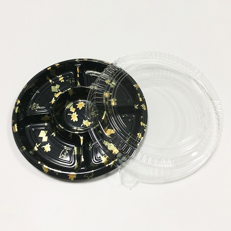 Scatola di sushi monouso in plastica rotonda con coperchio a cinque griglie Corpo di salmone spina venduto Scatola da pranzo in confezione
